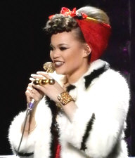  Hire Andra Day - book her for an event. 