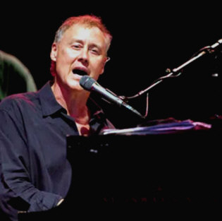 Hire Bruce Hornsby - booking Bruce Hornsby information.