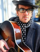  book Elvis Costello - booking information 