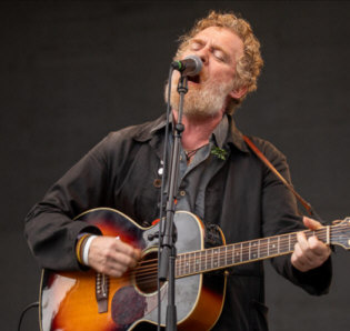   Hire Glen Hansard - booking Glen Hansard information.  