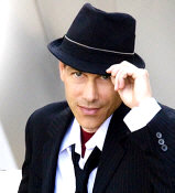   Gregg Karukas - booking information  -- photo credit: Ken Weil