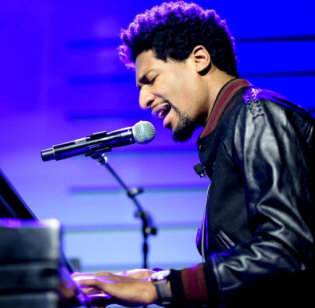 Hire Jon Batiste - booking Jon Batiste information.