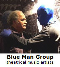   Richard De La Font with Blue Man Group  