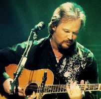  How to hire Travis Tritt - booking Travis Tritt information. 