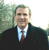 Brent Mendenhall as George W. Bush 